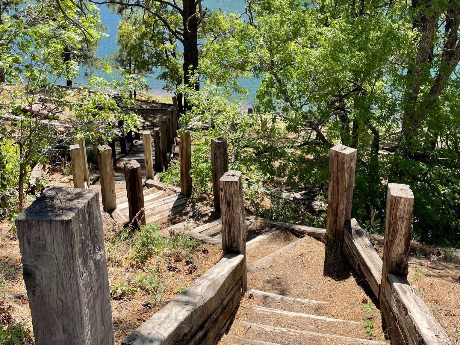 Wooden steps descending to the water. Photo credit: Melissa Garnett, NMDGF